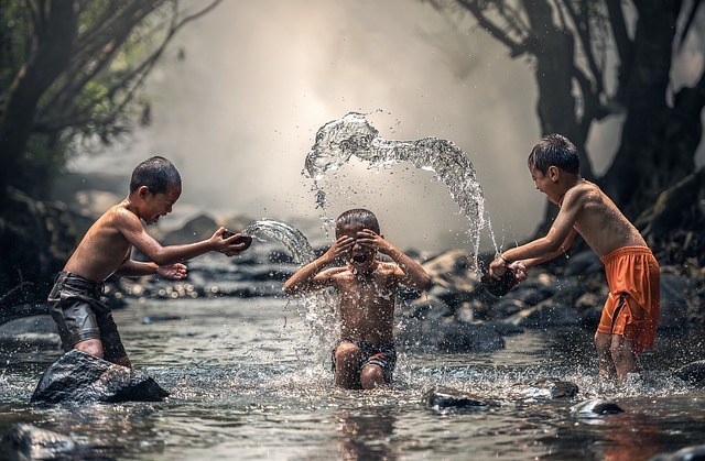 children-river-playing